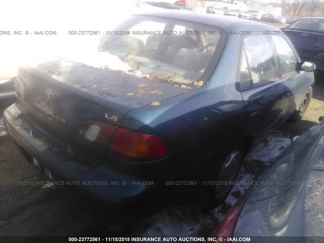 1NXBR18E7WZ047091 - 1998 TOYOTA COROLLA VE/CE/LE Navy photo 4