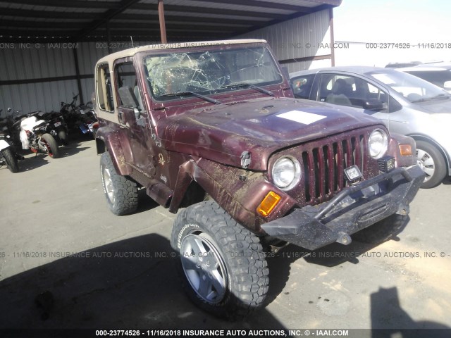 1J4FA59S92P718661 - 2002 JEEP WRANGLER / TJ SAHARA BURGUNDY photo 1