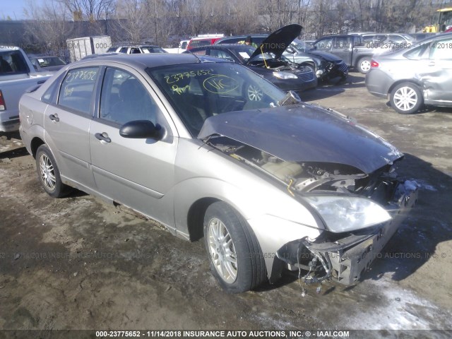 1FAFP34N25W209084 - 2005 FORD FOCUS ZX4 TAN photo 1