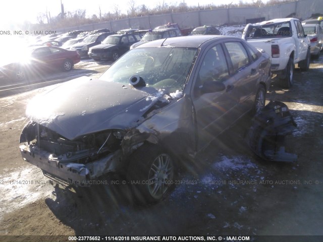 1FAFP34N25W209084 - 2005 FORD FOCUS ZX4 TAN photo 2