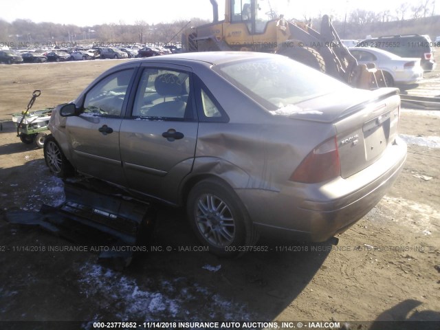 1FAFP34N25W209084 - 2005 FORD FOCUS ZX4 TAN photo 3