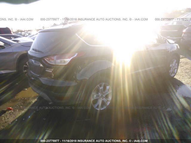 1FMCU0J95EUA21792 - 2014 FORD ESCAPE TITANIUM BLACK photo 4