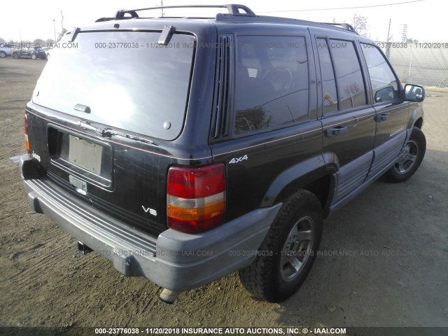 1J4GZ58Y9VC511864 - 1997 JEEP GRAND CHEROKEE LAREDO/TSI BLACK photo 4