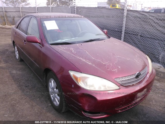 JTDBF30K920016470 - 2002 TOYOTA CAMRY LE/XLE/SE RED photo 1