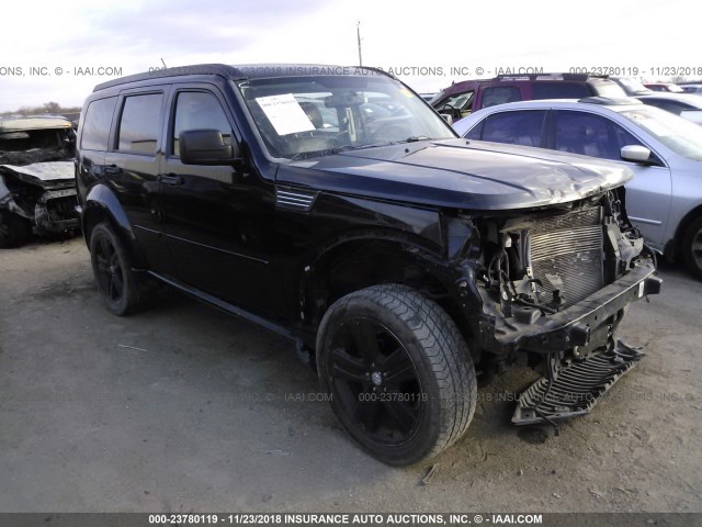 1D4PT4GXXBW606778 - 2011 DODGE NITRO HEAT BLACK photo 1