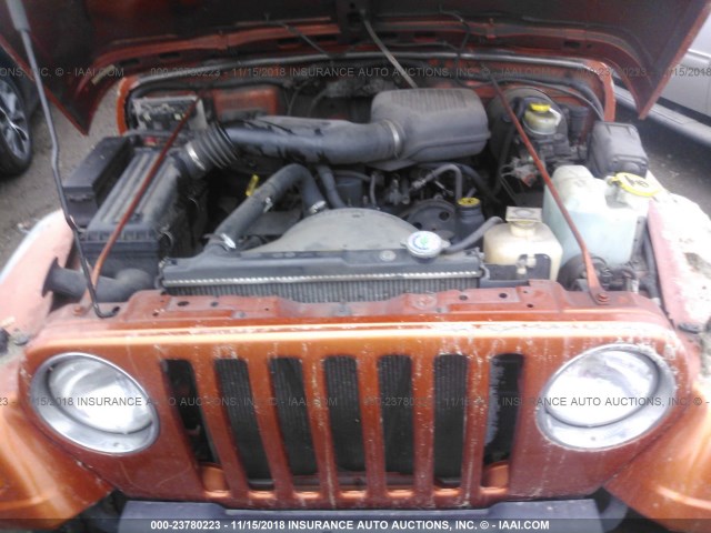 1J4FA29PXYP803124 - 2000 JEEP WRANGLER / TJ SE ORANGE photo 10