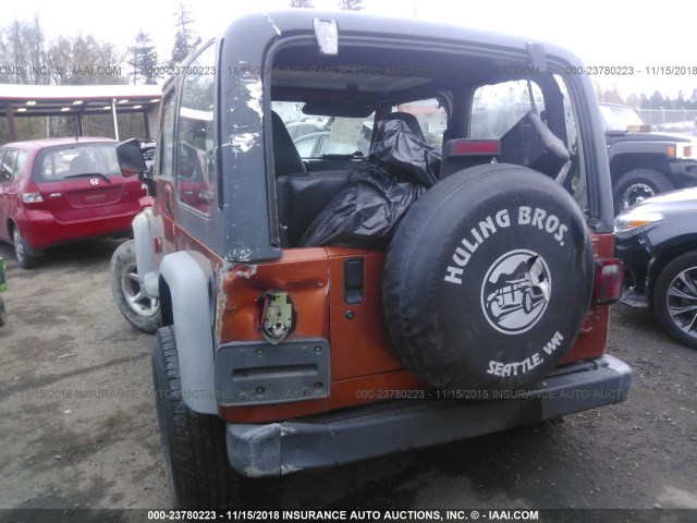 1J4FA29PXYP803124 - 2000 JEEP WRANGLER / TJ SE ORANGE photo 3