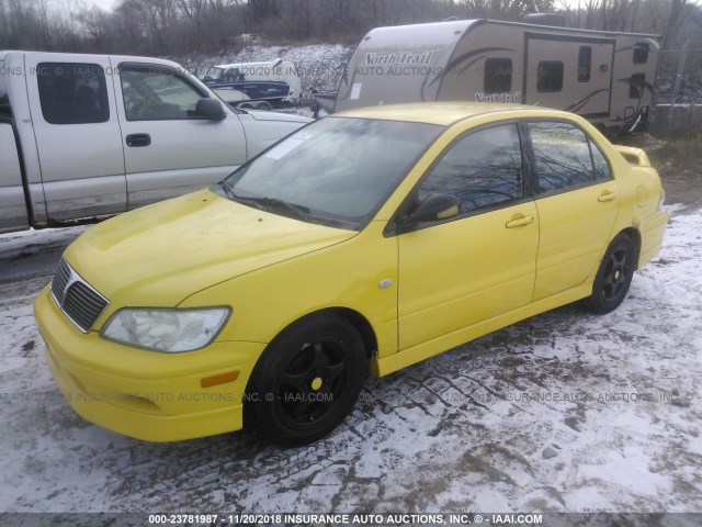 JA3AJ86EX2U066293 - 2002 MITSUBISHI LANCER OZ RALLY YELLOW photo 2