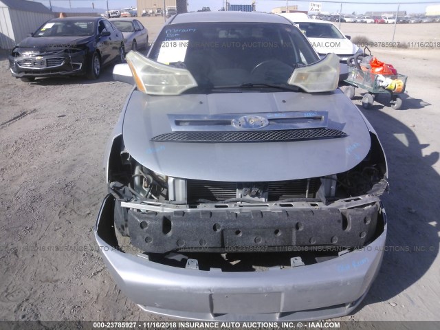 1FAHP36NX9W114669 - 2009 FORD FOCUS SES SILVER photo 6