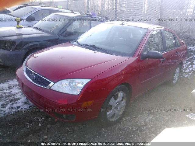 1FAFP34N25W188463 - 2005 FORD FOCUS ZX4 RED photo 2