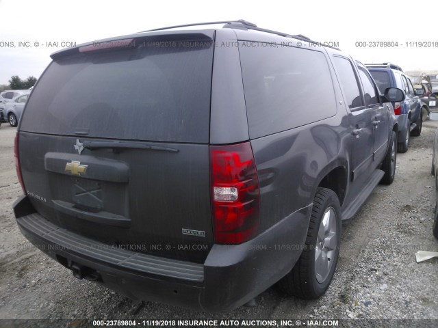 1GNUCJE05AR205521 - 2010 CHEVROLET SUBURBAN C1500 LT BLACK photo 4