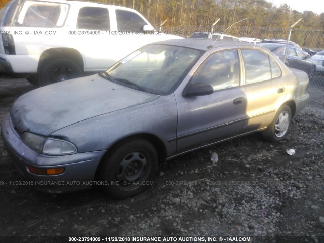 1Y1SK5260VZ455981 - 1997 GEO PRIZM LSI GRAY photo 2