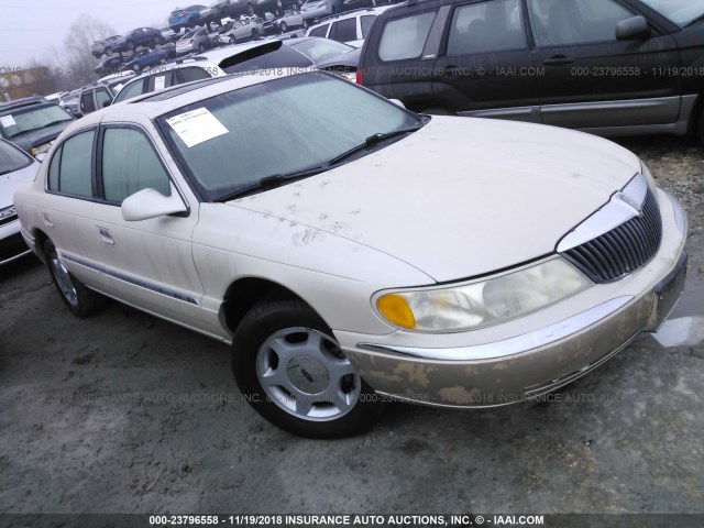 1LNHM97V81Y633728 - 2001 LINCOLN CONTINENTAL  CREAM photo 1