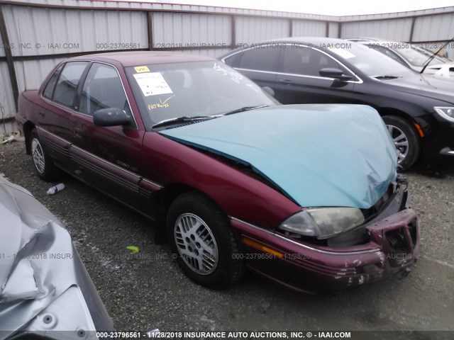 1G2NE5538RC789490 - 1994 PONTIAC GRAND AM SE RED photo 1