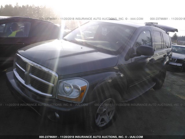 1D4HB58D74F144037 - 2004 DODGE DURANGO LIMITED SILVER photo 2