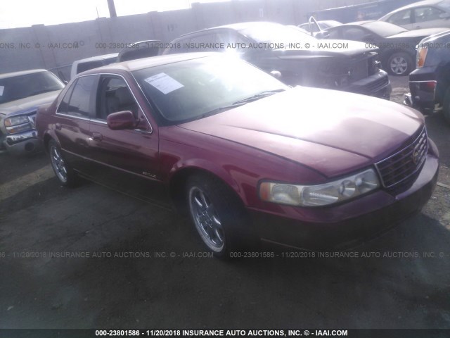1G6KY5295YU128241 - 2000 CADILLAC SEVILLE STS RED photo 1