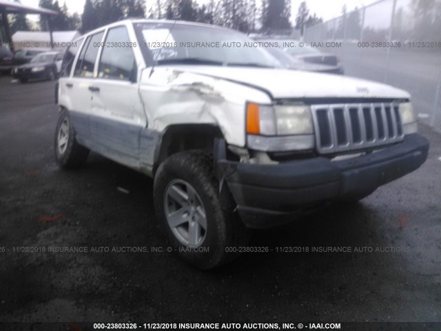 1J4GZ58S1VC569284 - 1997 JEEP GRAND CHEROKEE LAREDO/TSI WHITE photo 1