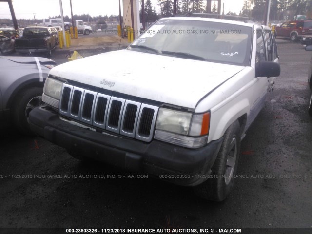 1J4GZ58S1VC569284 - 1997 JEEP GRAND CHEROKEE LAREDO/TSI WHITE photo 2