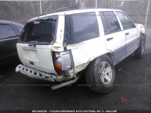 1J4GZ58S1VC569284 - 1997 JEEP GRAND CHEROKEE LAREDO/TSI WHITE photo 4