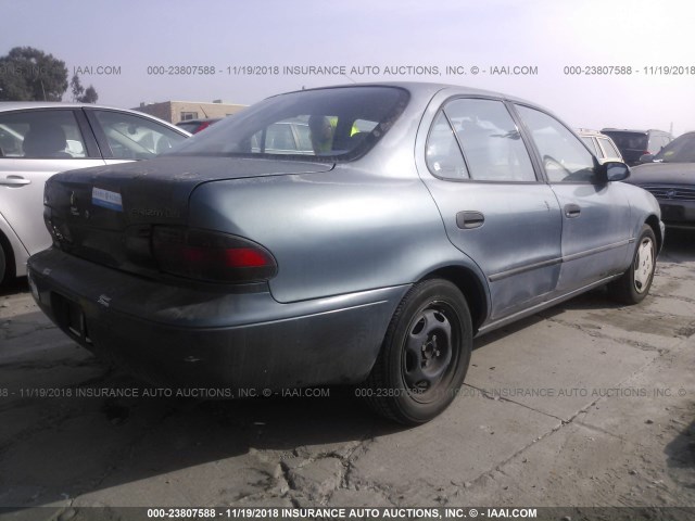 1Y1SK5365RZ043057 - 1994 GEO PRIZM LSI Dark Blue photo 4