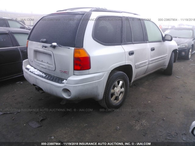 1GKDT13S042363182 - 2004 GMC ENVOY SILVER photo 4