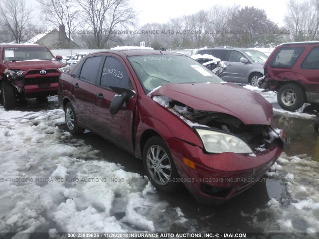 1FAFP34N95W187620 - 2005 FORD FOCUS ZX4 RED photo 1