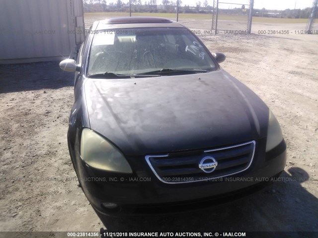 1N4BL11D52C285325 - 2002 NISSAN ALTIMA SE BLACK photo 6