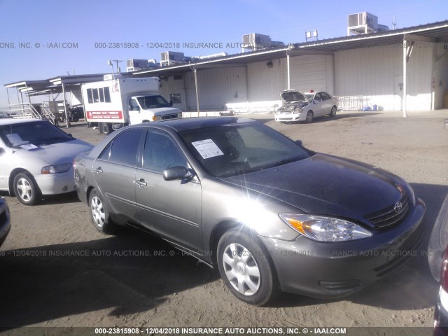 4T1BE30K43U697436 - 2003 TOYOTA CAMRY LE/XLE/SE GOLD photo 1