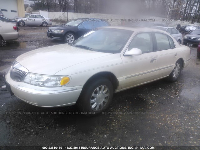 1LNHM97V4YY789260 - 2000 LINCOLN CONTINENTAL  CREAM photo 2