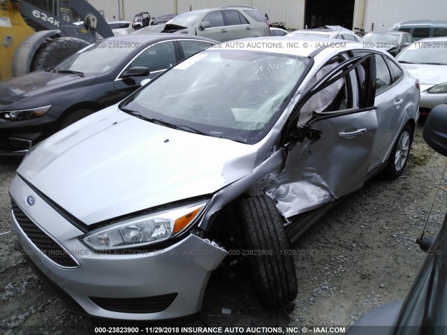 1FADP3F21HL241654 - 2017 FORD FOCUS SILVER photo 6