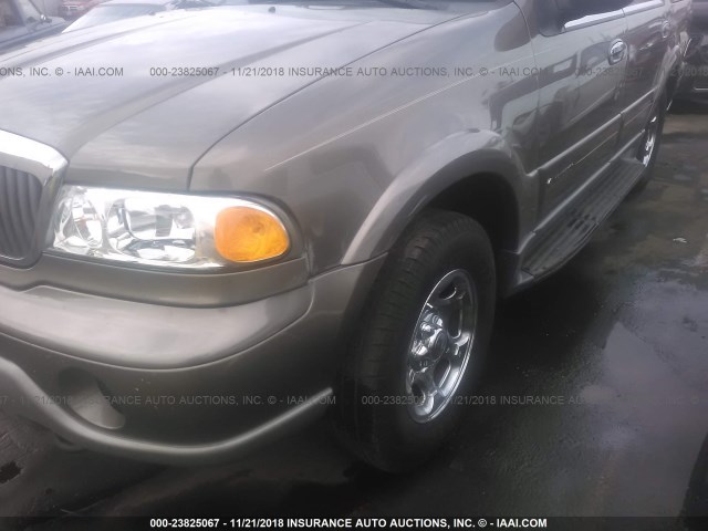 5LMFU28R52LJ16379 - 2002 LINCOLN NAVIGATOR Күміс фото 6