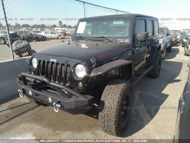 1C4BJWDG3CL225029 - 2012 JEEP WRANGLER UNLIMITE SPORT BLACK photo 2