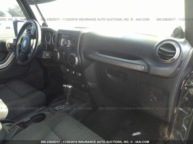 1C4BJWDG3CL225029 - 2012 JEEP WRANGLER UNLIMITE SPORT BLACK photo 5