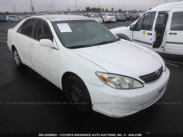 4T1BE30K03U197693 - 2003 TOYOTA CAMRY LE/XLE/SE WHITE photo 1