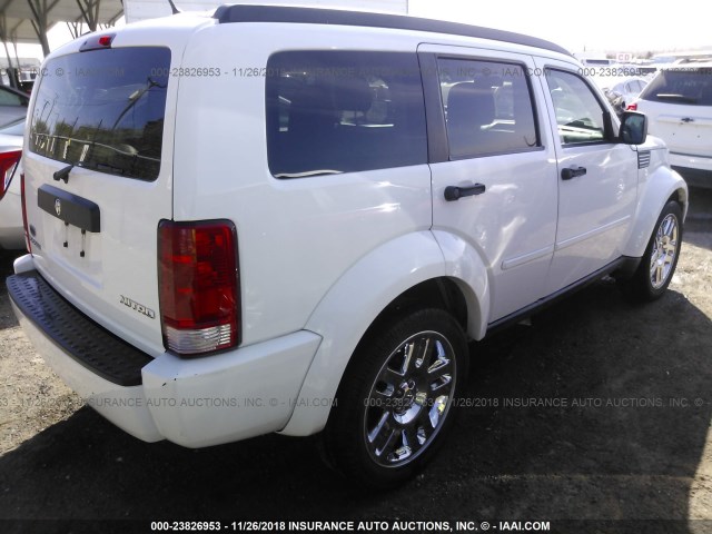 1D4PT4GK0BW605398 - 2011 DODGE NITRO HEAT WHITE photo 4