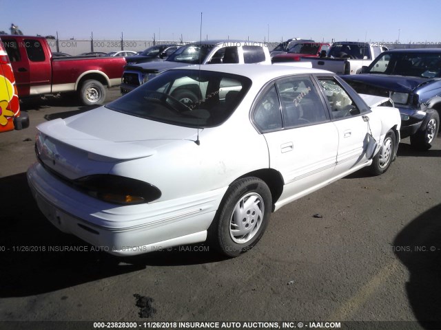 1G2HX52K1VH273486 - 1997 PONTIAC BONNEVILLE SE WHITE photo 4