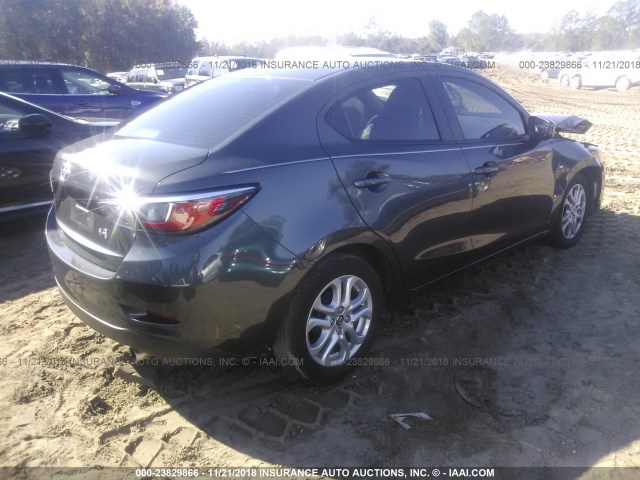 3MYDLBZV5GY132434 - 2016 TOYOTA SCION IA GRAY photo 4