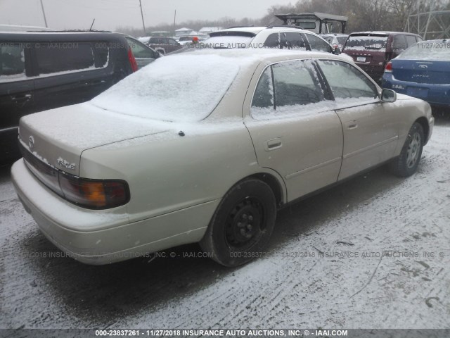 4T1VK13E6NU004045 - 1992 TOYOTA CAMRY XLE GOLD photo 4