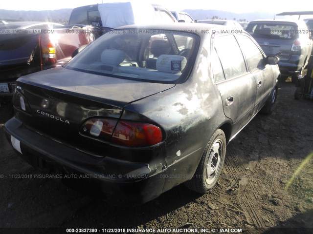 1NXBR12E5XZ204966 - 1999 TOYOTA COROLLA VE/CE/LE BLACK photo 4