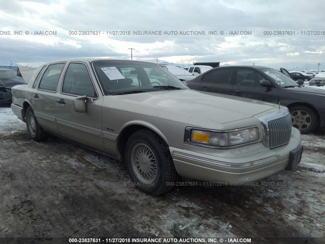 1LNLM82W4VY758980 - 1997 LINCOLN TOWN CAR SIGNATURE/TOURING GOLD photo 1