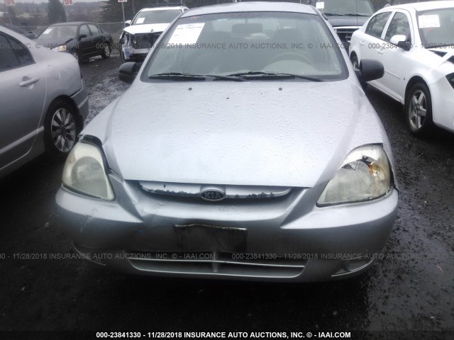 KNADC125746292396 - 2004 KIA RIO SILVER photo 6