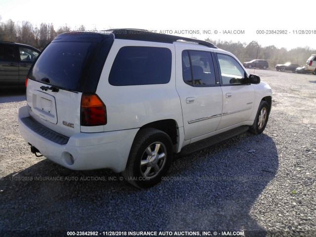 1GKES16S866100579 - 2006 GMC ENVOY XL WHITE photo 4