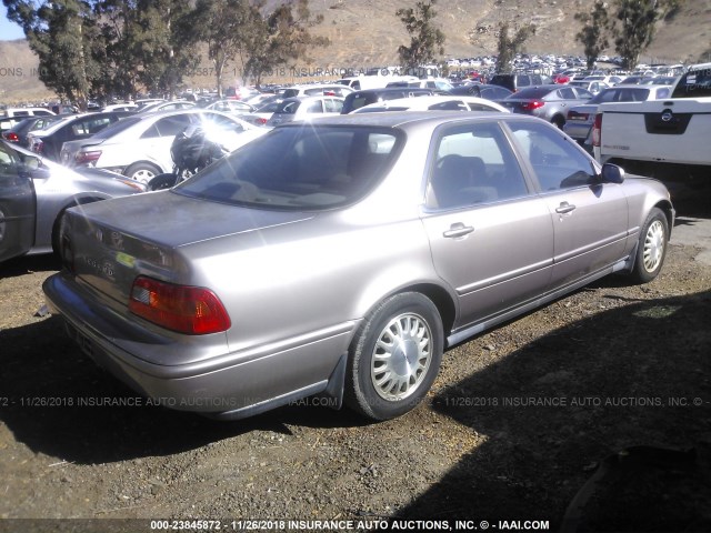 JH4KA766XRC012712 - 1994 ACURA LEGEND L Dark Brown photo 4