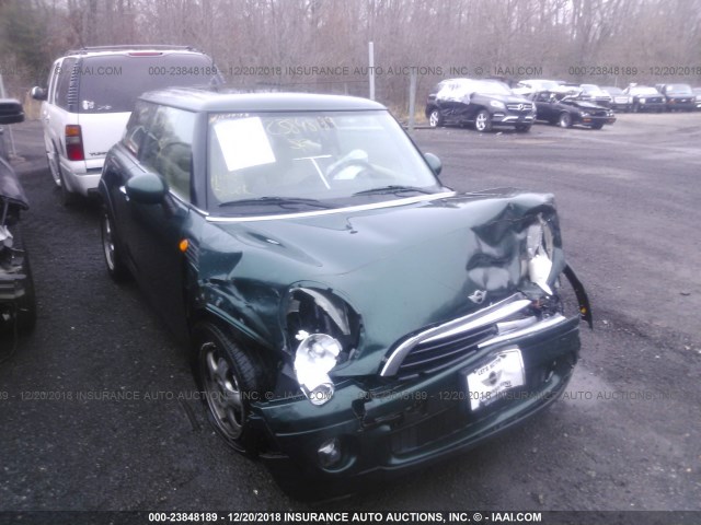 WMWMF33549TU72784 - 2009 MINI COOPER GREEN photo 1