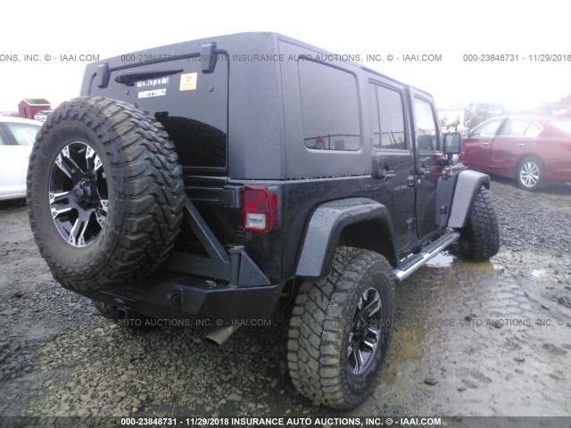 1J4BA5H14AL103688 - 2010 JEEP WRANGLER UNLIMITE SAHARA BLACK photo 4