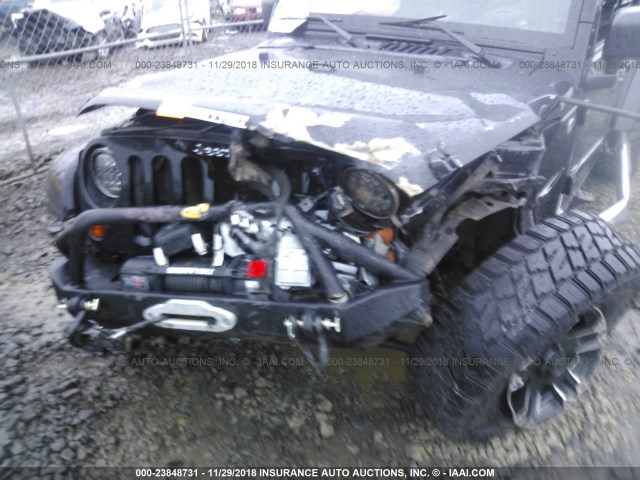 1J4BA5H14AL103688 - 2010 JEEP WRANGLER UNLIMITE SAHARA BLACK photo 6