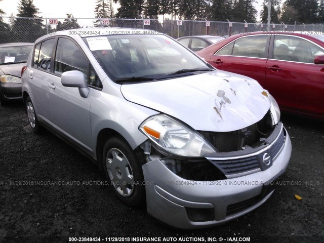 3N1BC13E69L381613 - 2009 NISSAN VERSA S/SL SILVER photo 1