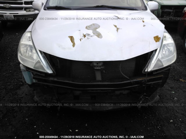 3N1BC13E69L381613 - 2009 NISSAN VERSA S/SL SILVER photo 6