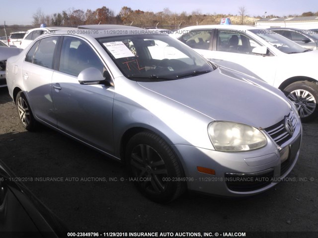 3VWRZ71KX9M165230 - 2009 VOLKSWAGEN JETTA SE/SEL SILVER photo 1