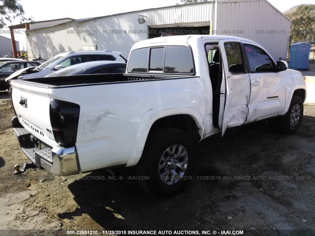 3TMAZ5CN5HM032966 - 2017 TOYOTA TACOMA DBL CAB/SR5/TRD SPORT/OR WHITE photo 4